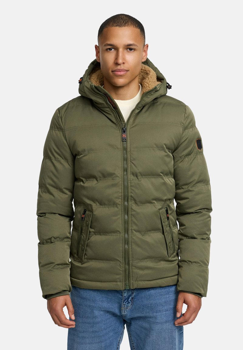 Green padded jacket with a zip closure and hood, featuring a beige fleece lining, two front pockets, and logo patch on the sleeve.