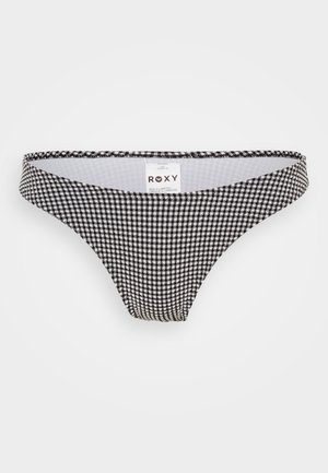 Črno-bela pikasta bikini spodnja del z nizkim pasom in ozkimi stranmi. Ima oznako iz blaga z logotipom "ROXY" na hrbtni strani.