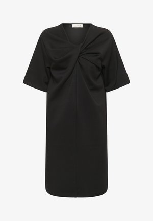 Črna obleka s kratkimi rokavi, ki ima na prsih ovit vozel, narejena iz mehke tkanine z sproščenim, ohlapnim krojem. Enostavna zasnova dolžine do kolen.