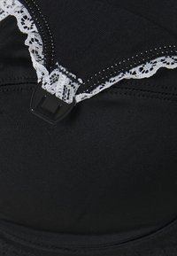 Sans Complexe NEW CARESSE SOUTIEN GORGE EMBOÎTANT SANS ARMATURE - Soutien com aro - black/ivoire