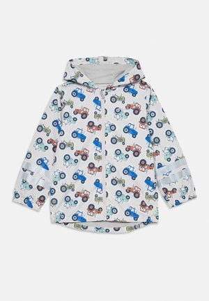 White children's hooded jacket with zipper, printed all over with colorful tractor illustrations in blue, orange, and green.