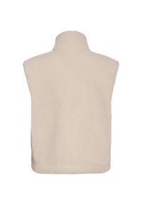 Μπεζ αμάνικο γιλέκο από φλις με ψηλό γιακά, εμφανιζόμενο από πίσω, με μαλακό, υφή υφάσματος.