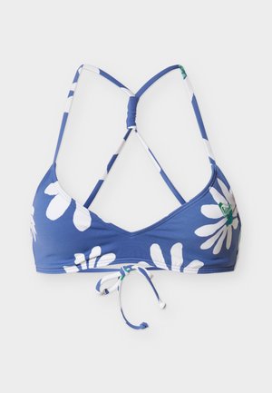 Top de bikini azul con estampados de margaritas blancas, tirantes finos entrecruzados y cierre con lazo en el centro delantero.