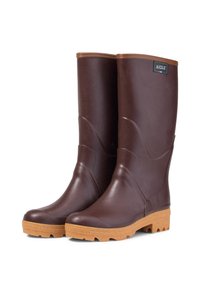 Bruine rubberen kniehoge laarzen met een textuurafwerking en een contrasterende beige rubberen zool. Merklabel zichtbaar aan de zijkant.