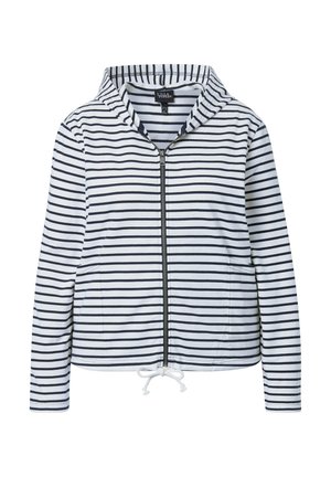 Veste blanche à capuche avec des rayures horizontales noires, fermeture éclair à l'avant, deux poches et un cordon de serrage à l'ourlet.