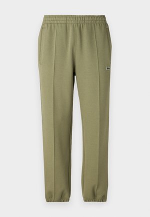 Olivové tepláky s elastickým pásom, dvoma bočnými vreckami a zúženými členkami, s malým logom na prednej strane.