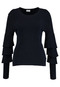 Navy ribbed knit sweater featuring flared cuffs with layered ruffles, round neckline, and fitted body.