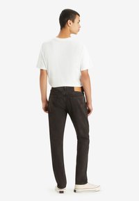 Levi's® 502™ brązowy