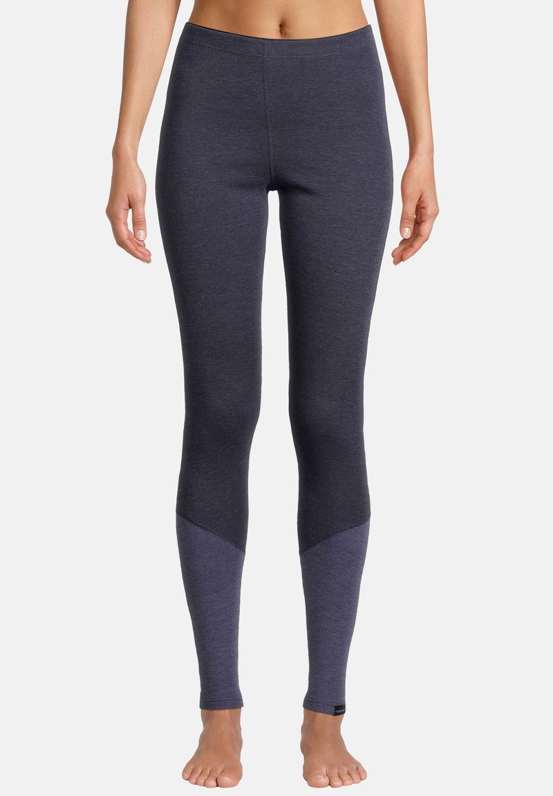 Marineblå leggings med en tekstureret, kontrasterende nederste del. Glat stof, høj talje, tætsiddende design og ingen synlige lukninger.