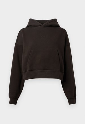 Cropped black hoodie made of soft fabric, featuring a kangaroo pocket, ribbed cuffs, and a textured logo detail on the chest.