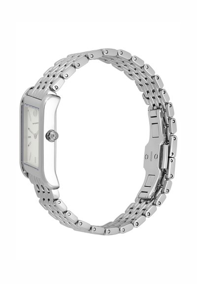 Montre-bracelet rectangulaire argentée avec bracelet métallique à maillons et couronne latérale, affichant un cadran blanc partiel avec des index horaires et le logo de la marque.
