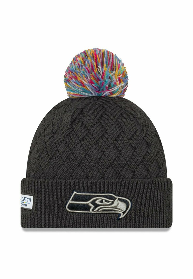 Knit black beanie with multicolored pom-pom on top. Features a woven pattern and a logo patch depicting a bird's head on the cuff.