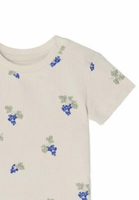 Kortærmet ribbet T-shirt i lys beige med tryk af blå drueklaser og grønne blade. Har rund halsudskæring og trykknaplukning.