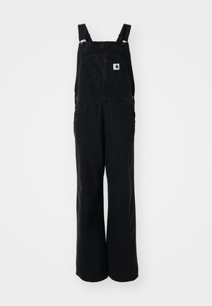 Salopette in denim nero con gambe larghe, spalline regolabili, tasca frontale e toppa con logo sul petto. Tessuto resistente con una finitura opaca.