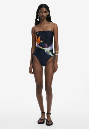 Strapless one-piece swimsuit in navy, featuring vibrant floral and bird print. Includes side ties and a smooth, supportive texture.