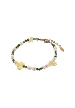 Finom karkötő arany csattal, váltakozó zöld csiszolt gyöngyökkel, kis fehér gyöngyökkel és áttetsző sárga virág alakú gyöngyökkel.