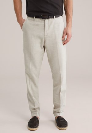 - Spodnie materiałowe