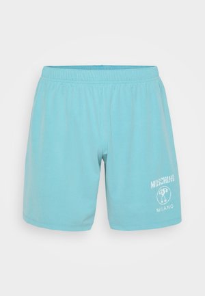 Svetlo modri kratki hlače iz rebraste tkanine z elastičnim pasom. Imajo bele natisnjene logotipe z načrtom medveda in besedilom "MOSCHINO MILANO."