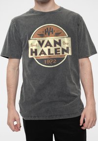 Gray cotton t-shirt featuring a distressed print with a circular design, "VAN HALEN," and 1972 in copper and gold colors. Short sleeves, crew neck.