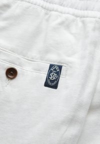 MERCHANT - Nohavice chinos - optic
