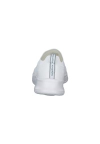White mesh athletic shoe featuring a padded collar, a smooth rubber sole, and a reflective accent on the rear. Minimalistic design overall.