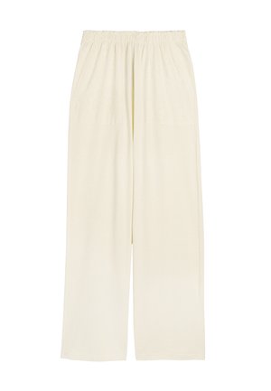 Szerokie spodnie plisowane w jasnym kremowym kolorze, z elastycznym paskiem w talii, bocznymi kieszeniami oraz gładką, miękką teksturą.