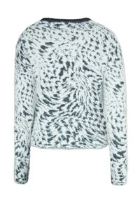 Strickpullover mit weißem Grund und schwarzem wirbelndem Muster. Hat lange Ärmel und einen runden Halsausschnitt, gefertigt aus weichem, flauschigem Material.