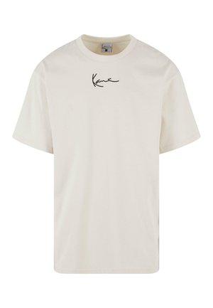 Cream-colored cotton T-shirt with short sleeves. Features a black signature text logo on the front. Round neck and relaxed fit design.