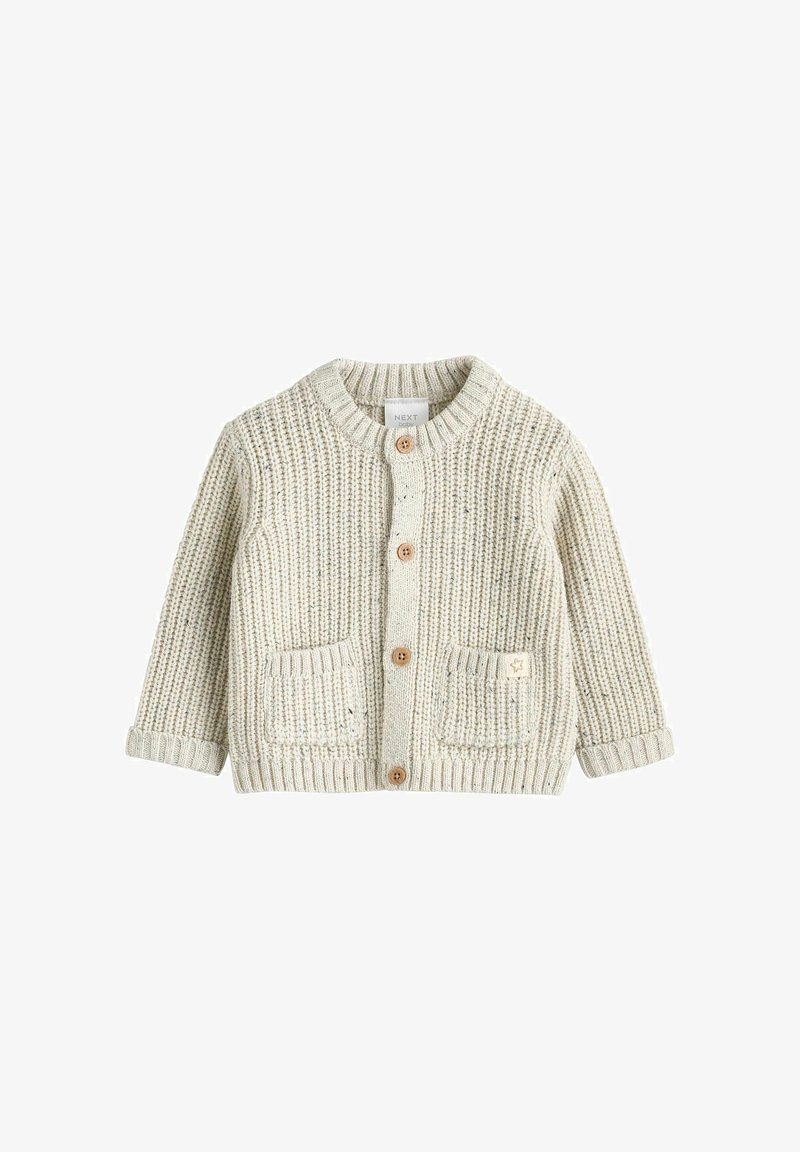 Cardigan per bambini color crema in maglia, con bottoni in legno e due tasche frontali, presenta un colletto e polsini a coste.