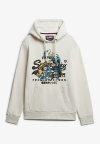 Sudadera blanca con bolsillo canguro frontal, capucha con cordón y un gráfico colorido con acentos en azul y negro.
