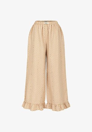 Beżowe szerokie spodnie z małymi wielokolorowymi kropkami, elastycznym paskiem i falbanami na dole nogawek.