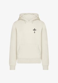 Sudadera beige de tejido suave, con un bolsillo canguro en el frente y un pequeño bordado negro de una cruz en el pecho.