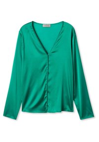 Tehtävä Vera pitkähiha, syvän V-kaula-aukon ja etupainikkeen sulkemisella. Ominaisuuksina sileä pinta ja hienovarainen laskostus sivuilla.