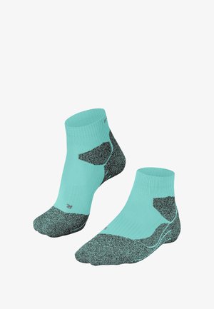 Enkellange sokken in aqua met zwarte gespikkelde accenten, voorzien van een gestructureerd patroon en versterkte hiel en teen voor extra duurzaamheid.