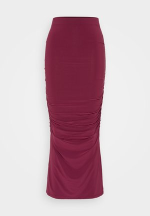 Gonna midi fitted bordeaux con dettagli arricciati lungo i lati, realizzata in tessuto stretch morbido, con una vita alta.