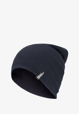 Dark blue knit beanie with ribbed texture, soft fabric, and a sewn-on logo label. Designed for warmth and comfort in cold weather.