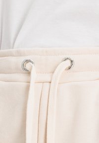 JOGGING BASIC - Trainingsbroek - jet stream white