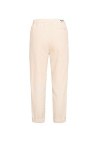 Beige gewebte Hose mit elastischem Bund, gerafften Bündchen und einer einzigen Gesäßtasche. Der Stoff hat ein strukturiertes Muster.