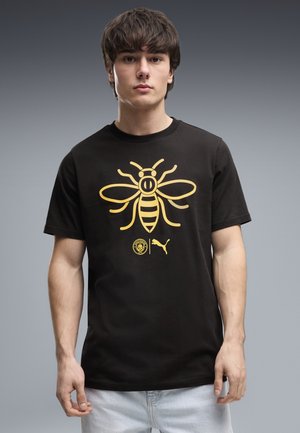 Puma, MANCHESTER CITY FTBLCULTURE T-SHIRT - Klub merchandise - black-flaxen