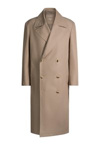 Trench-coat beige croisé avec larges revers et six boutons, manches longues et coupe droite.