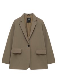 Blazer beige en tissu doux, avec un bouton noir unique, deux poches frontales et un col classique.