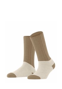 Braune gerippte Socken mit einer cremefarbigen Spitze, Ferse und Bündchen. Das Design zeichnet sich durch strukturierter Stoff aus und variiert in der Farbe entlang der Länge.