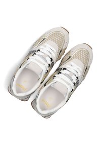 Beige and gray athletic shoes with mesh upper, white laces, and black accents. Features textured panels and a gold logo.