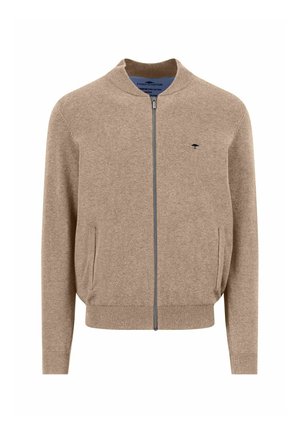 Lichtbruine ritsvest met geribde kraag, manchetten en zoom, voorzien van twee voorzakken en een klein zwart geborduurd logo op de borst.