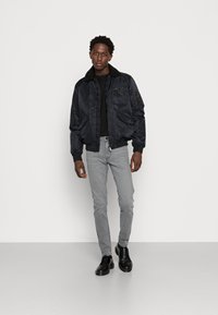 Lee MALONE - Calças de ganga de corte skinny - washed westport