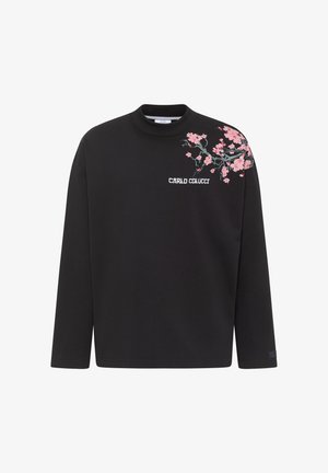 Must mustaongiga neelaga, millel on vasakul õlal roosa lilleline tikand ja valge "Carlo Colucci" logo. Sile puuvillane kangas.