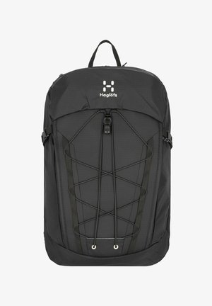 Sac à dos noir de forme rectangulaire, avec un design en corde bungee à l'avant et une poignée de transport en haut. Le logo est affiché sur le devant.