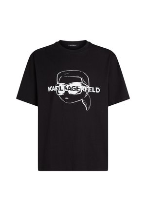 T-shirt en coton noir avec un croquis blanc d'un personnage portant des lunettes de soleil. Le texte "KARL LAGERFELD" est imprimé en dessous du graphique.