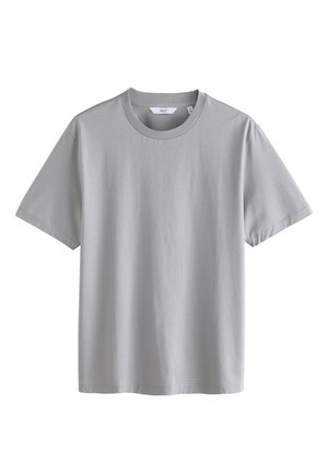 Lysegrå bomulds-T-shirt med korte ærmer, rund halsudskæring og lige kant. Glat tekstur uden mønstre eller detaljer.