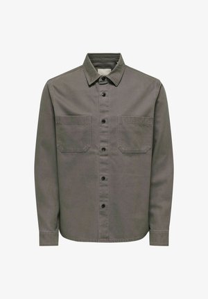 Graues Baumwollhemd mit Kragen, zwei Brusttaschen und langen Ärmeln mit knöpfbaren Manschetten.